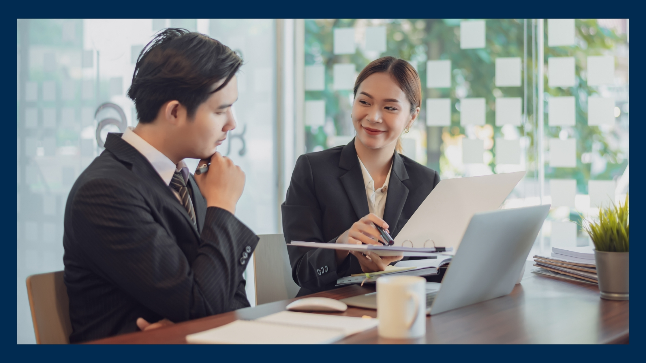 A man and a woman in a business deal