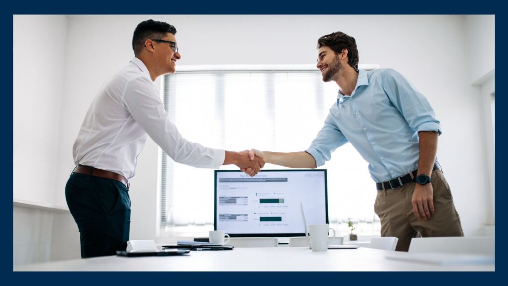 Two businessmen shaking hands